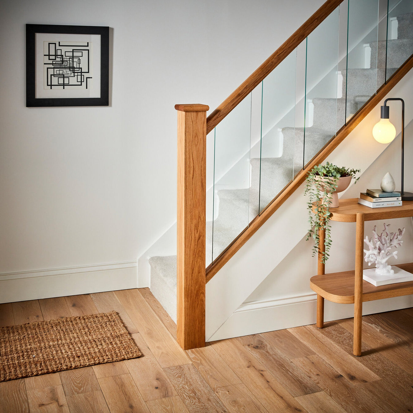 Newel post which has been revitalised using our timber cladding kit 