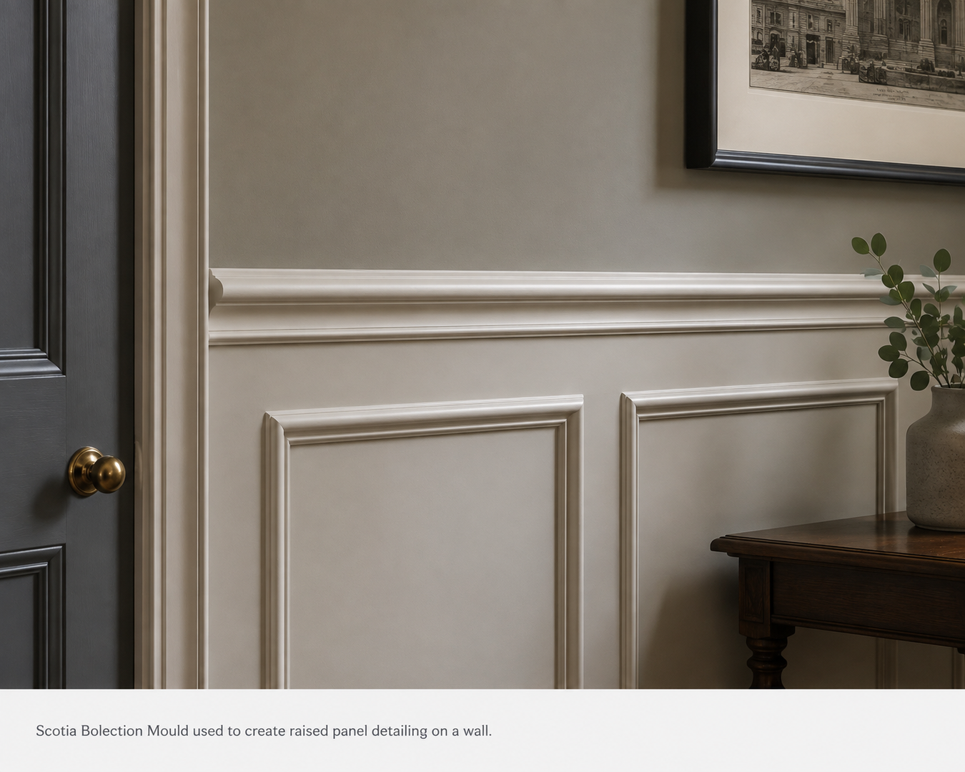 Scotia bolection moulding creating raised wall panelling in a traditional interior.