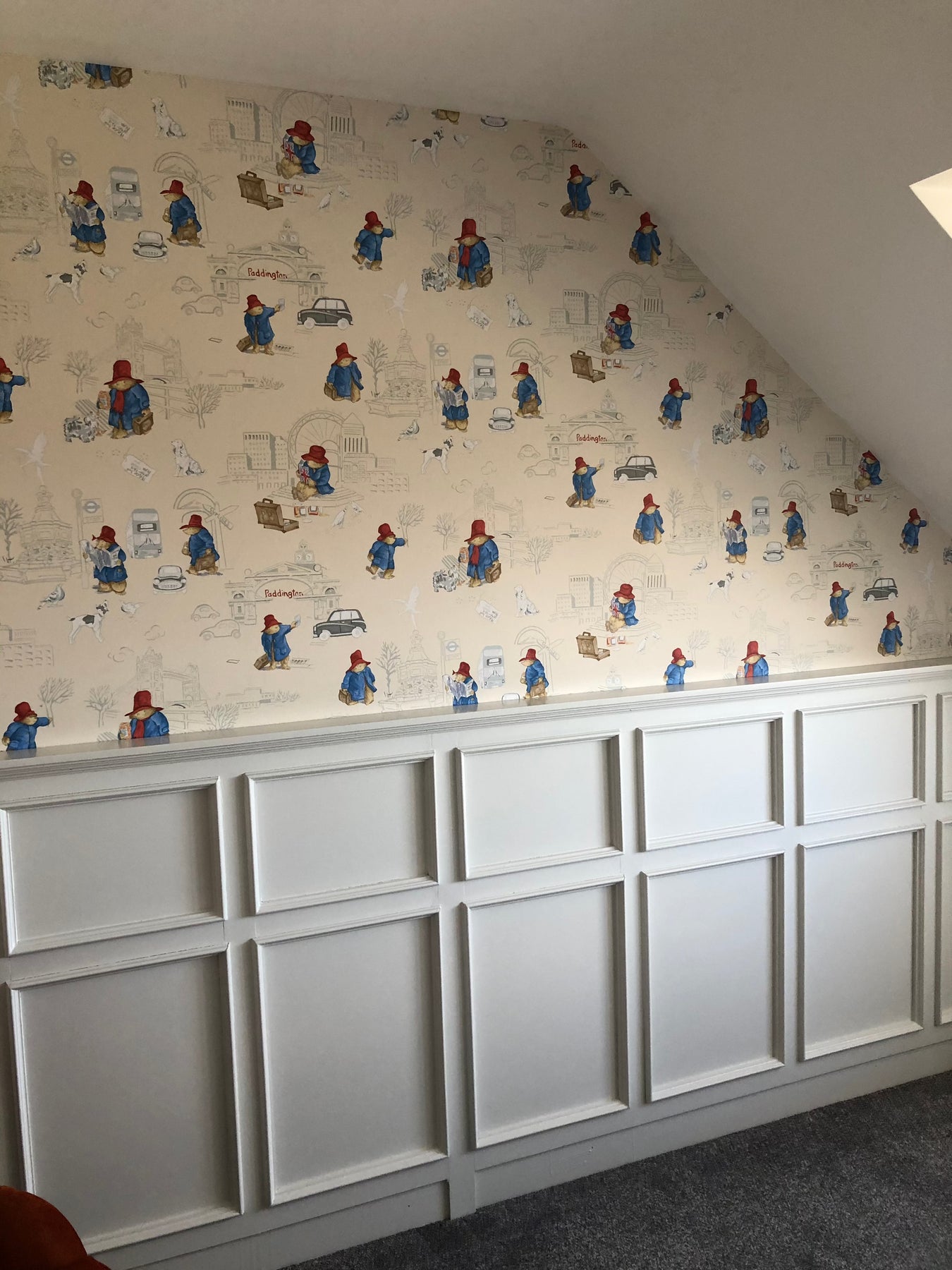 Shaker style paneling featuring inset mouldings and elegant capping for a refined finish.